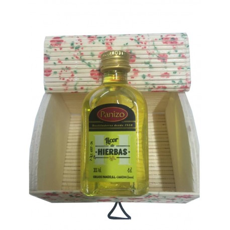 Baúl floreado con licor en miniatura