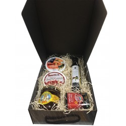 Cesta pequeña con pimentón, aceite, miel, jamón curado y lata aceite, ajo y tomate para empresas
