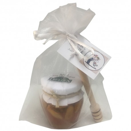 Tarro de miel con almendras y palito catador para empresas